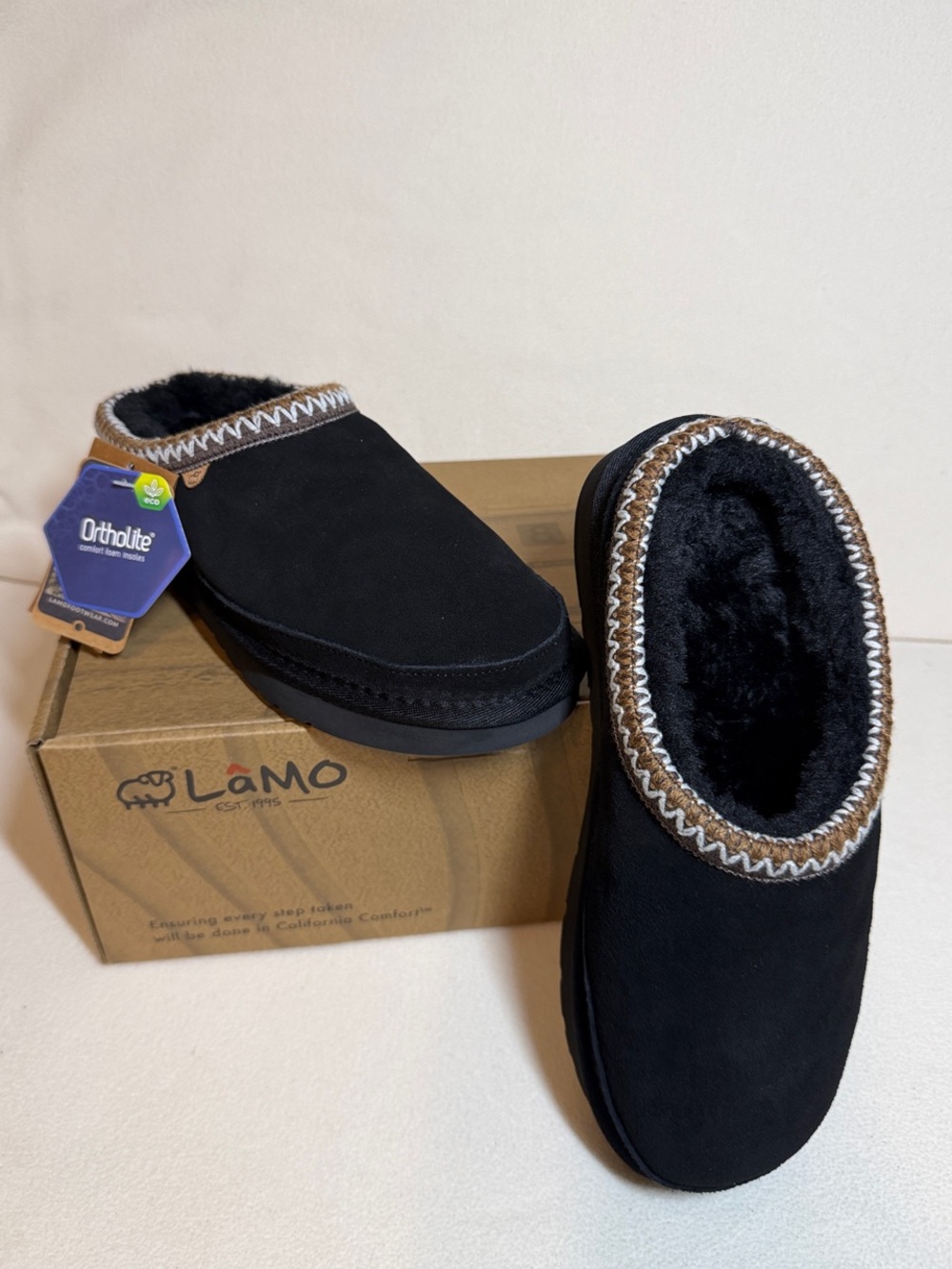 Lamo Women's Black Slip-On Slippers with Brown Trim